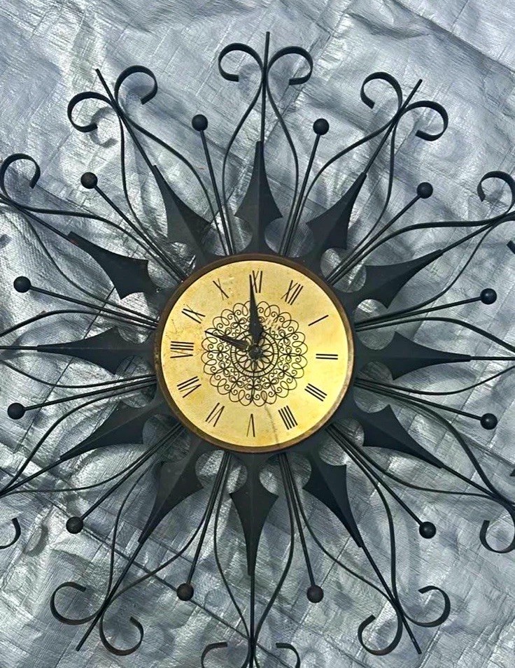 Black Metal Sunburst Wall Clock, Gold Face Roman Numerals, Battery Quartz
