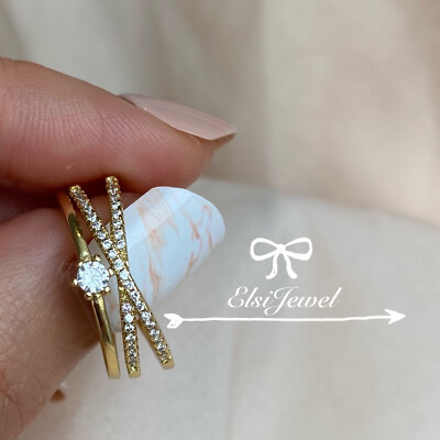 Triplets-cross-solitaire Zircon 18k Gold Ring