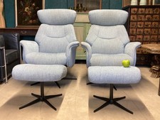 A FINE PAIR OF MID CENTURY DESIGNED SWIVEL RECLINER CHAIRS ARMCHAIRS