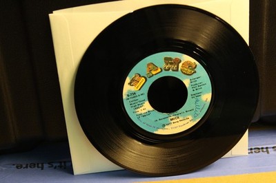 BRICK 45 RPM RECORD..JOHN FB 4
