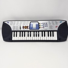 Casio SA-67 Electronic Song Bank Keyboard 100 Tones 30 Patterns Silver Black