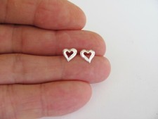 Sterling Silver 7mm dainty Open Heart post stud earrings.