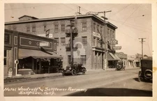 Bellflower CA Scene: Model T , Hotel Woodruff, Bank Pharmacy RPPC  Postcard COPY