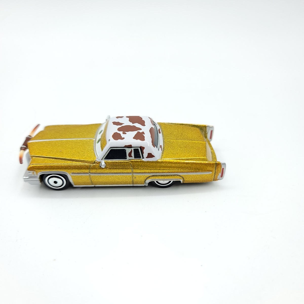 BOLD DISNEY PIXAR 1970'S CADILLAC COUPE DEVILLE METALLIC GOLD W