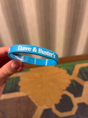 A blue Dave & Buster's bracelet in good condition and it s never been used it ha