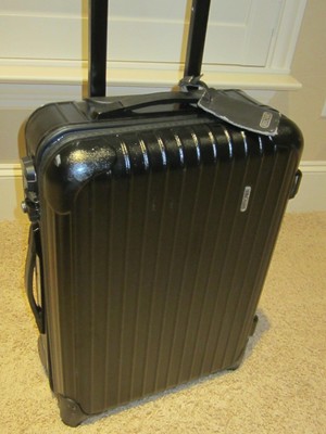 rimowa black suitcase