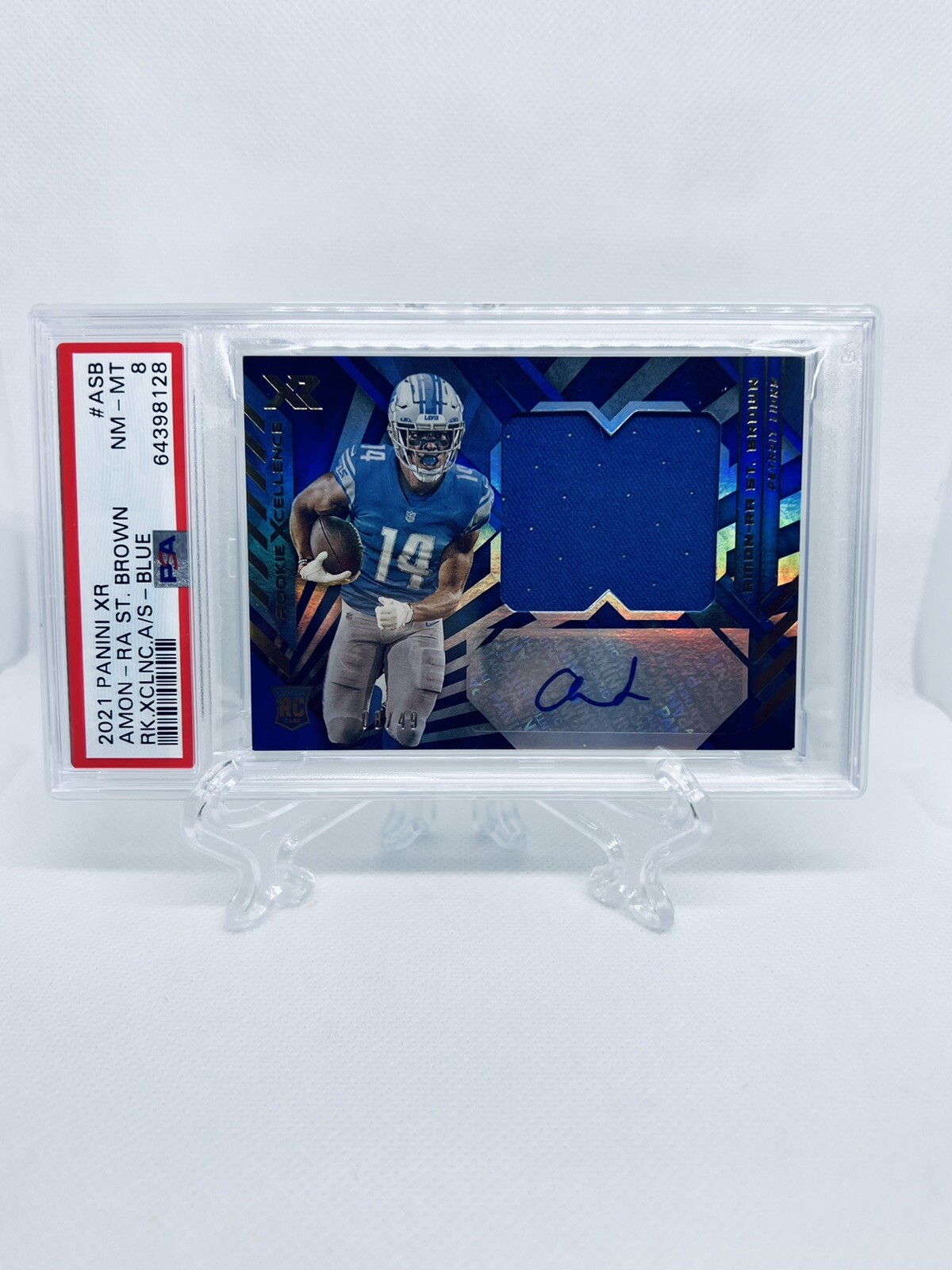 Amon-Ra St. Brown Panini XR Rookie Xcellence Autograph Swatches #ASB Blue