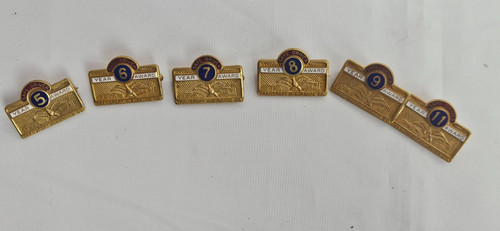 TRANSPORT INSURANCE CO. 2 4 5 6 7 9 10 YEAR SAFE DRIVER AWARD ENAMEL PIN LOT.