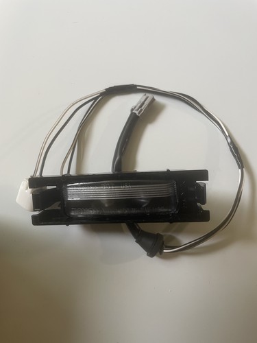TOYOTA COROLLA LICENSE PLATE LIGHT RH OEM 1998-2002 PASSENGER