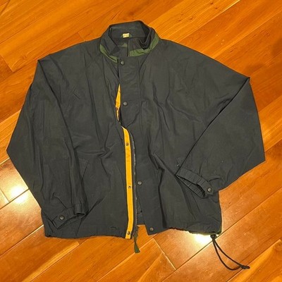 Navy blue vintage 90s windbreaker jacket with embroidered American Eagle