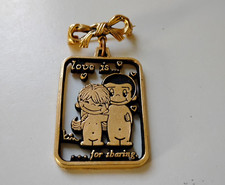 L A Times  "Love Is"  pendent