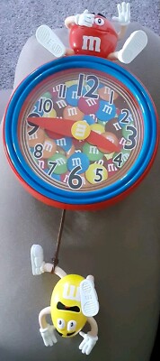 M&M Whimsical Sounds Pendulum Yellow M&M Wall Clock Red Yellow