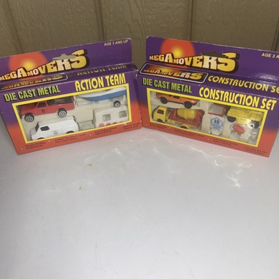 Lot Of 2 MEGA MOVERS DIE CAST METAL CONSTRUCTION & Action Team SET NEW In Box