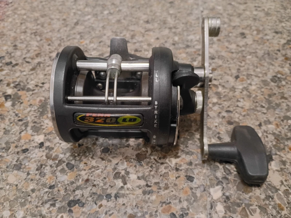 Okuma Magda Pro Moulinet de pêche à la traîne Levelwind avec compteur