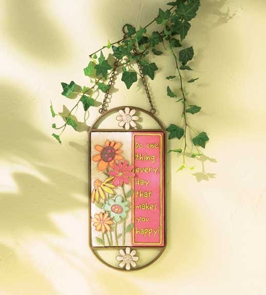 A chunky 3D folk-art Crazy Daisy plaque mixing stone and metal accents — the kind of tactile, handcrafted wall piece you stumble upon at a roadside gallery and can't stop thinking about.