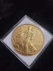 $1 2012 1 OZ FINE SILVER EAGLE "GOLD SILVER" IN EXELENT CONDITION 🔥