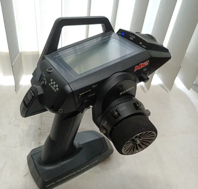 Émetteur Sanwa M12 seulement 2,4 GHz pour modèles radiocommandés parfait état - Photo 1/4