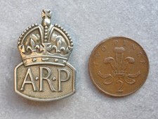 The scarcer female pin back WW2 ARP badge in 'German Silver' issued 1940 - 1943