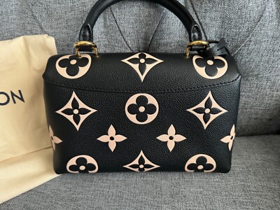 Louis Vuitton Madeleine Handbag Bicolor Monogram Empreinte Giant