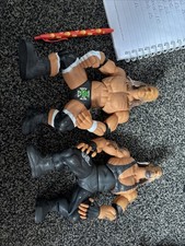 WWE Ring Giants Figures Triple H And The Undertaker 