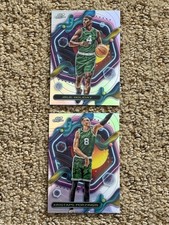 2023-24 Topps Cosmic Chrome Celtics Refractor Lot (2) Porzingis & Jrue Holiday