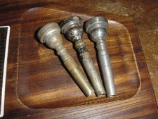 THREE VINTAGE TRUMPET MOUTHPIECE S ONE BENGE 7C TWO UNMARKED
