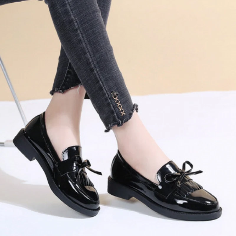 Patent leather loafers store with tassels