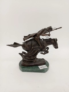 The Cheyenne Frederic Remington 1901 sculpture of a warrior on a marble base