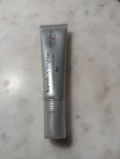 Laura Geller: Banish-n-Brighten Concealing Luminizer in Tan