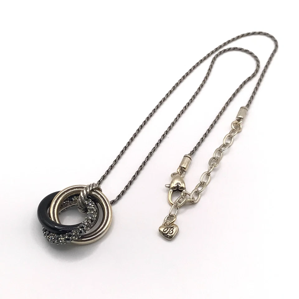 Collar Colgante Brighton Cristal Blanco y Negro Anillos Entrelazados Placa Plata Foto 2 de 4