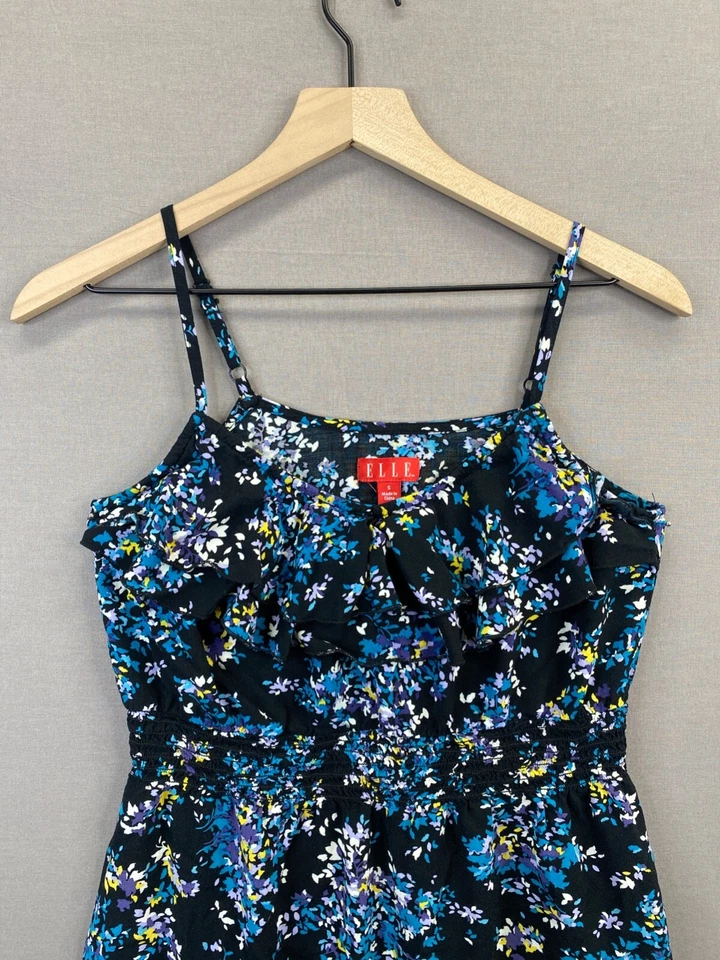 Camiseta sin mangas azul con volantes florales y bolsillos Elle para mujer sin mangas cuello en V talla pequeña Foto 3 de 4