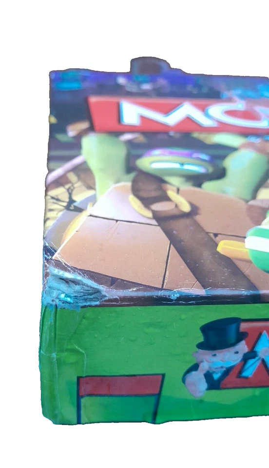 JOGO DE TABULEIRO MONOPÓLIO EDIÇÃO TARTARUGAS NINJA ADOLESCENTE MUTANTE DANIFICADO CAIXA DANIFICADA - Imagem 3 de 4