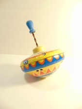 older metal toy spinning top showing a circus train; Ohio Art Co., Bryan, Ohio