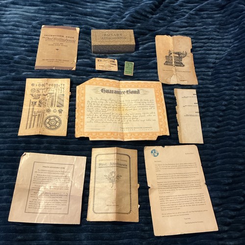 Vintage set of manuals, guaranteed bonds, and the letters + rotary attachments￼