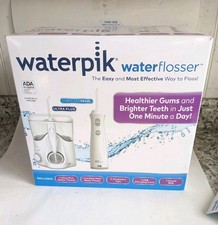 Waterpik Water Flosser Ultra Plus  Cordless Pearl Water Flosser Combo Pack