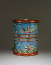 A Round Porcelain Brushpot, with a revolving outer face. 'QianLong' mark
