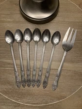 Set Of 6 Stainless Teaspoons & One Serving Fork. Floral Pattern Made In China