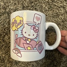 Taza Hello Kitty Avión Blanco Rosa