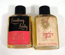 2 Old Fuller Brush Toilet Water Sample Bottles Sparkling Gold & Leading Lady