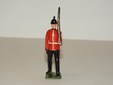 BRITISH SOLDIER MARCHING WITH RIFLE