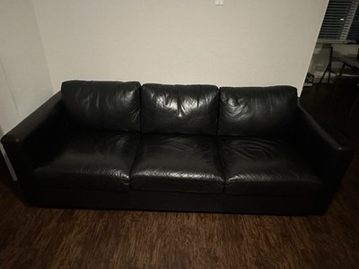 Black leather sofa, used for two years, relatively new. bought at ikea.