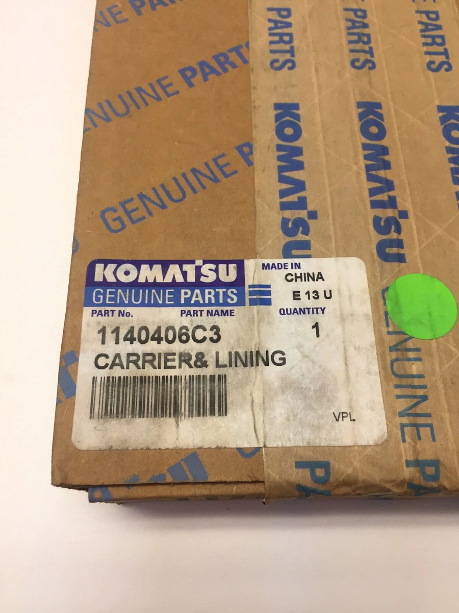 Komatsu Oem Carrier & Lining 1140406C3. Komatsu Nos Brake Pad 