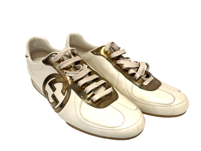 white and gold gucci shoes