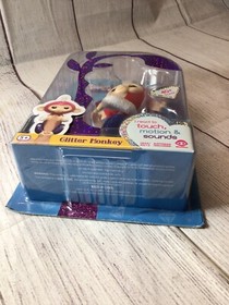 Fingerlings Glitter Monkey- Interactive Baby Pet (Red/White/Blue)-Liberty NEW