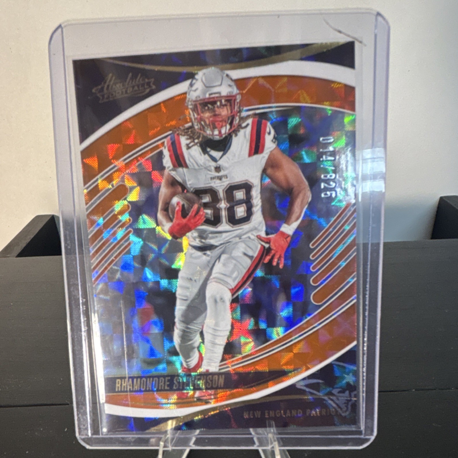 panini absolute green spectrum rhamondre stevenson #64 /825 patriots