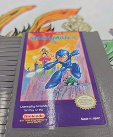 Mega Man 4 NES W. OEM Sleeve Tested & Working