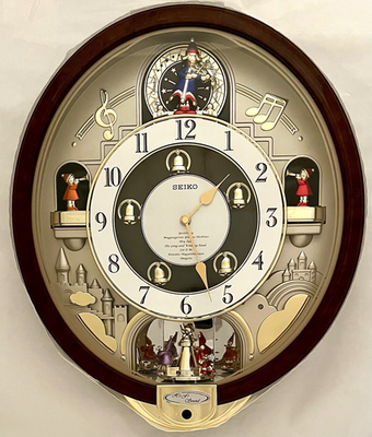 Seiko Melodies in Motion Musical Wall Clock Plays 7 Beatles Songs