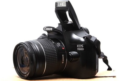 Canon EOS 1100D 12,2 MP FULL HD DSLR mit Canon EF 28-80mm II Objektiv + Zub