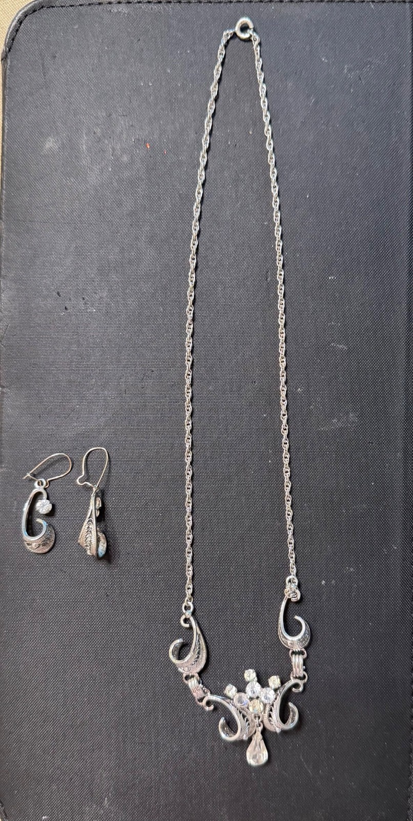 Matching sterling silver necklace and earring set