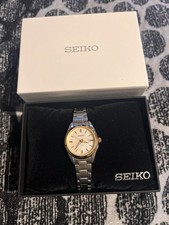 Seiko SUR636 Women s Quartz Two-Tone Stainless Bracelet White Dial Date Box